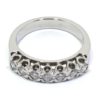 Alianza de oro blanco 18k con 7 diamantes en corona