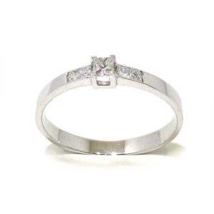 Anillo solitario oro blanco 18K diamante talla princesa 0,12 ct con diamantes