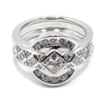 Anillo oro blanco con diamantes princesa