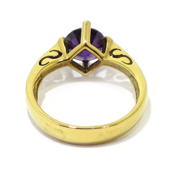 Anillo circonita morada de plata dorada
