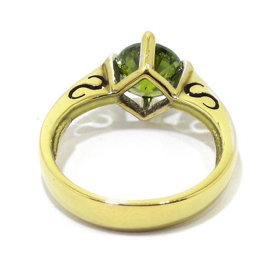 Anillo circonita verde de plata dorada