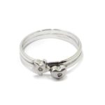 Anillo estrella corazon 2 diamantes oro blanco