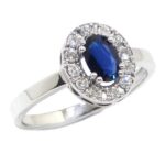 Anillo zafiro oval 6x4 diamantes oro blanco