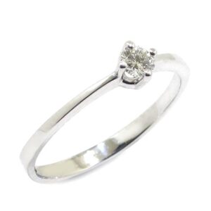 Anillo solitario diamante brillante 0.15ct garras cruz
