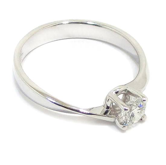 Anillo solitario diamante brillante 0.37ct garras oro