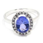 Anillo tanzanita 9x7 diamantes oro blanco