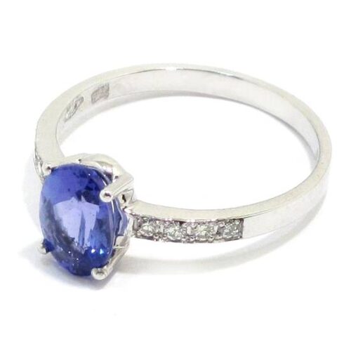 Anillo tanzanita 8x6 diamantes oro blanco