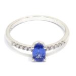 Anillo tanzanita 6x4 diamantes oro blanco